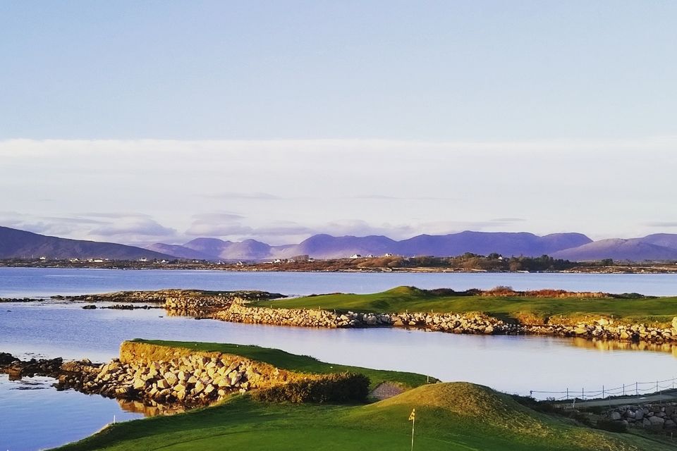 Connemara Isles Golf Club, island links course at sunset with Cill Chiaráin Bay