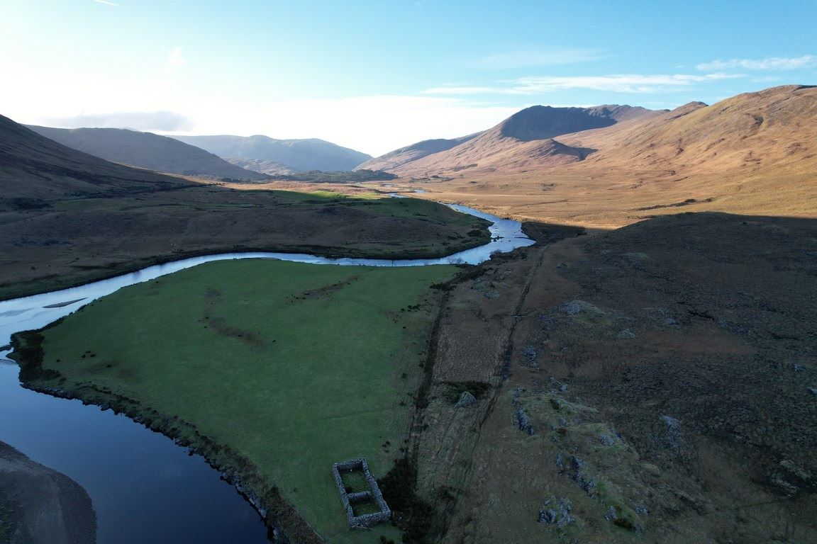Aerial view of the Erriff river system, Lough Derrintin and surrounding mountains